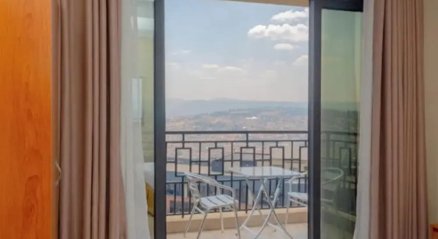 Апартаменты Deluxe Tropical Plaza Apartments