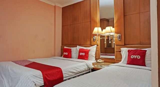 Четырёхместный семейный люкс OYO 671 Hotel Capitol