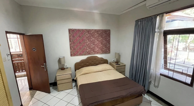 Camera Deluxe Hotel Gegerkalong Asri