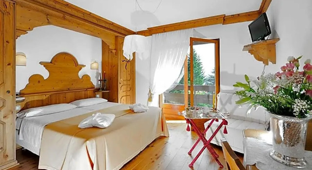 Hotel Touring, Забронировать Отель Отели Мадонна-ди-Кампильо 3 звезды, рядом с Кресельный подъёмник Гросте (нижняя станция), 3*