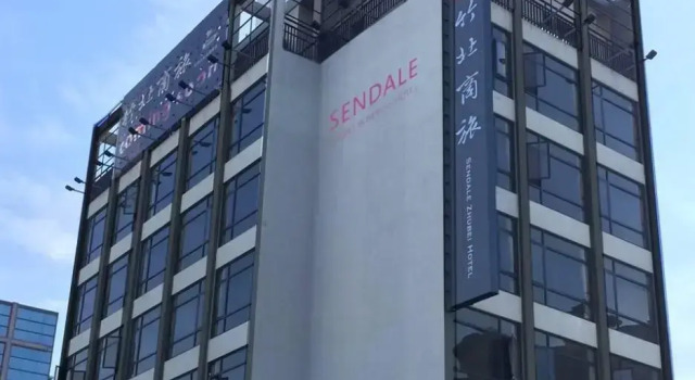Кровать в общем номере Sendale Zhubei Business Hotel