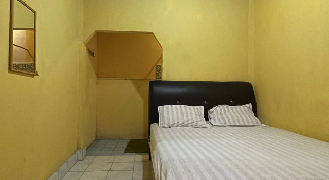 Номер Standard Hotel O Penginapan Asoka Indah Near PT. PLN (persero) Gardu Induk Barru