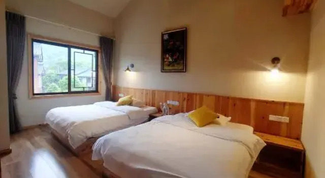 Suite 1 sypialnia Senhuxi Hostel
