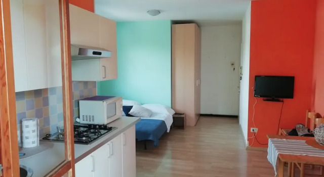 Lovely Studio With 12 Shared Pools - Beahost, Prenota Appartamento Hotel a Veneto con parcheggio, Parcheggio