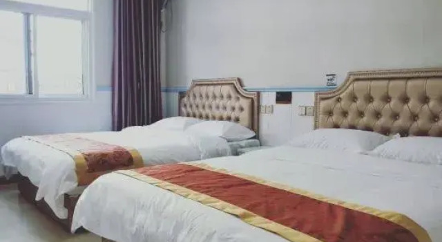 Кровать в общем номере Wuhan Xiyue Business Hotel (Wuhan Tianhe International Airport)