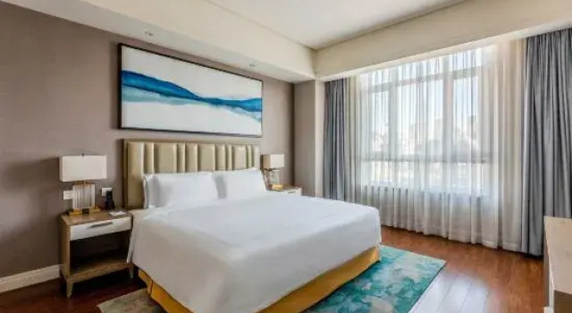 Люкс Deluxe с 2 комнатами CM+ Tianjin Binhai Serviced Apartment