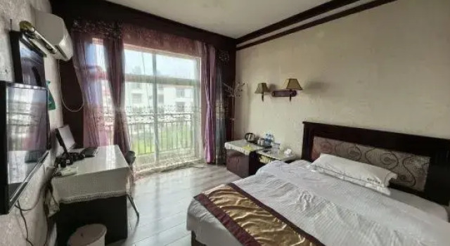 Nachi Denan Hotel, Varaa Hotelli Edulliset hotellit kohteessa Yunnan