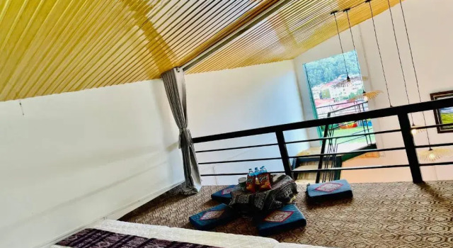 Кровать в общем номере Sapa Village Hotel