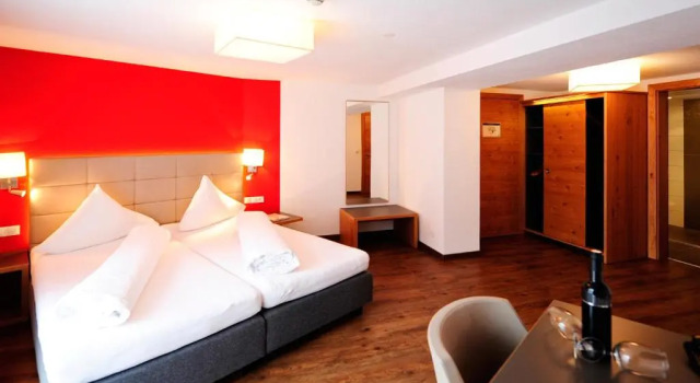 Апартаменты Hotel Garni Alpenland
