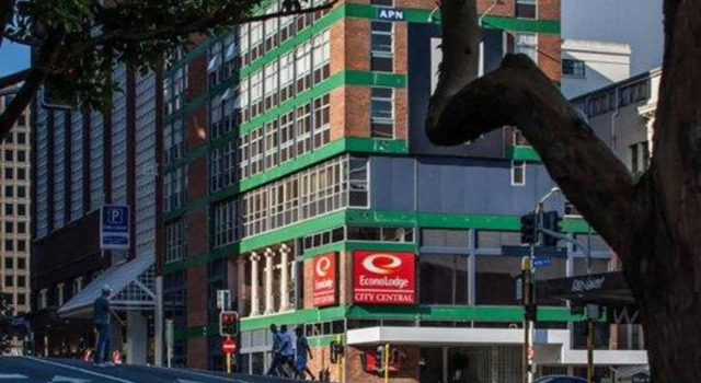 Кровать в общем номере Econo Lodge City Central