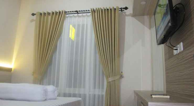 Modern Chic Room at Gendis Homestay, Book Hotel Sleman Yogyakarta Province