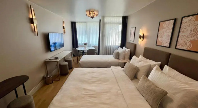 Superior Driepersoonskamer Weingart Suites Hotel