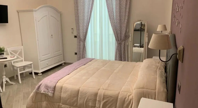Четырёхместный номер Deluxe B&B Le Stanze di Santa Chiara