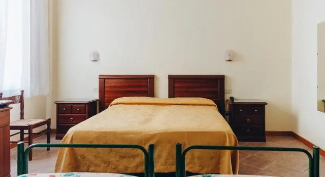 Четырёхместный номер Classic Hotel Savoia e Campana