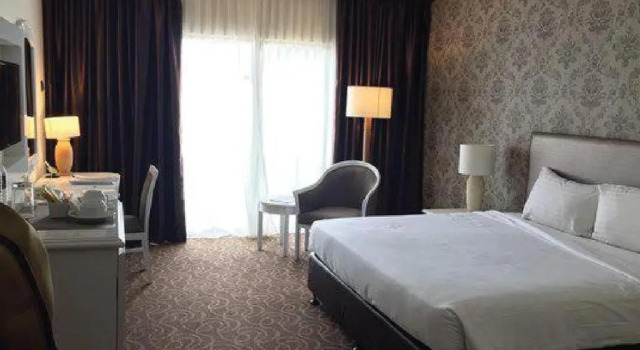 Номер Deluxe Mines Beach Resort
