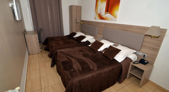 Четырёхместный номер Standard Hôtel Parisien