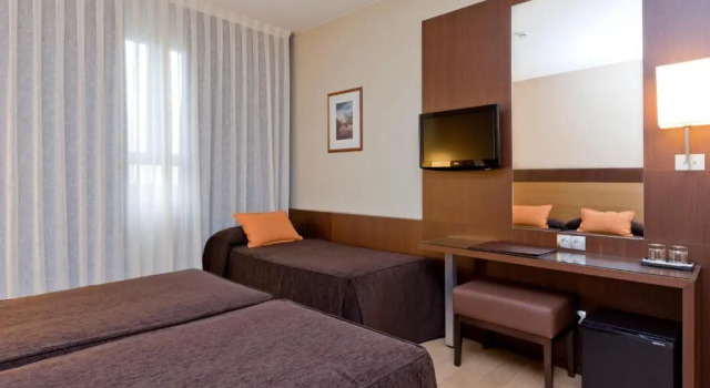 Трёхместный номер Hotel Ciudad de Alcañiz
