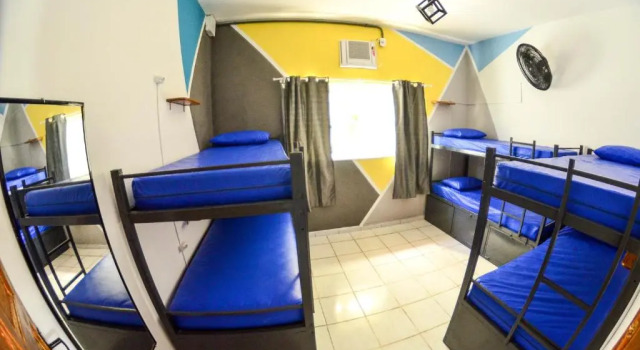Кровать в общем номере La Casa Hostel