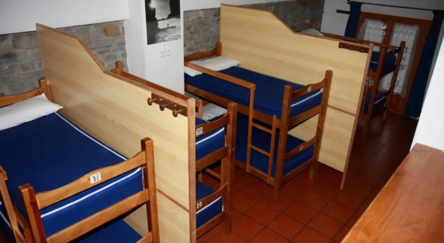Кровать в общем номере Refugio Lucien Briet