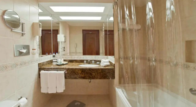 Четырёхместный люкс Radisson San Isidro Hotel & Suites
