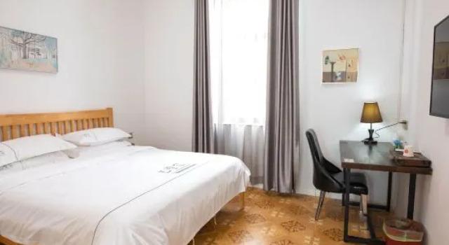 Люкс с 2 комнатами Shui'an Yishujia Old Villa Hostel