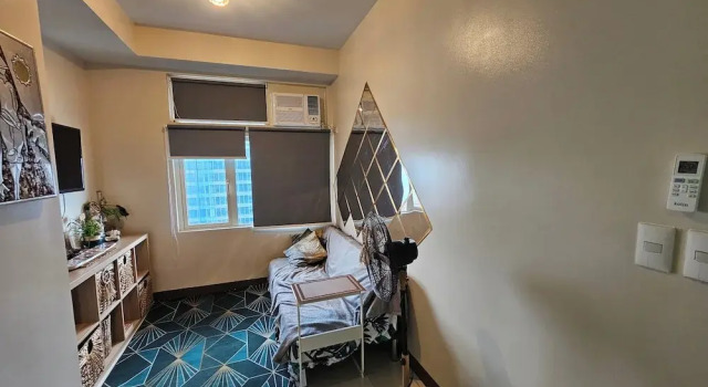 Апартаменты Makati Bliss Apartment - Cozy Urban Retreat