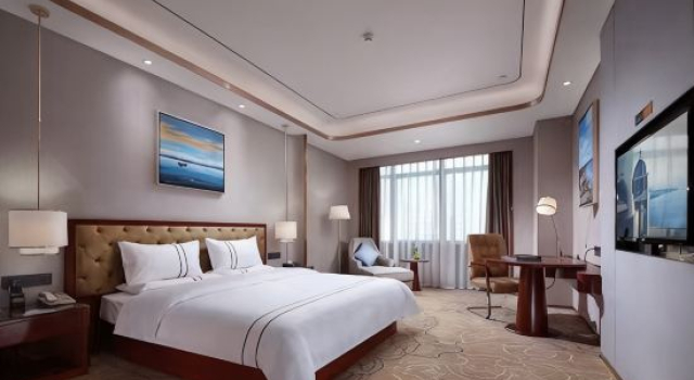 Кровать в общем номере Yeste Hotel (Longhai Flagship)
