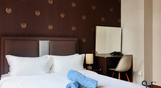 Номер Grand с балконом Homesuite Home at Riverson Soho