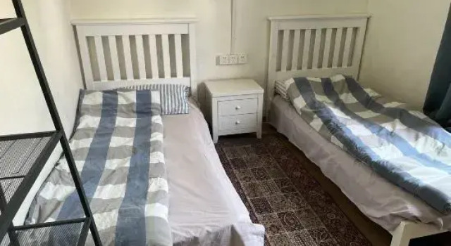 Кровать в общем номере (мужской номер) Ningbo Ivory Guest Youth Hostel