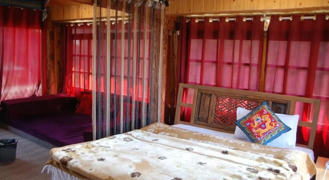 Lijiang Oriental Sun Hotel, Забронировать Отель Лицзян Юньнань, рядом с Улица Сквер-стрит Древнего города Даянь