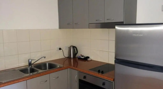 Апартаменты Executive Frisco Apartments