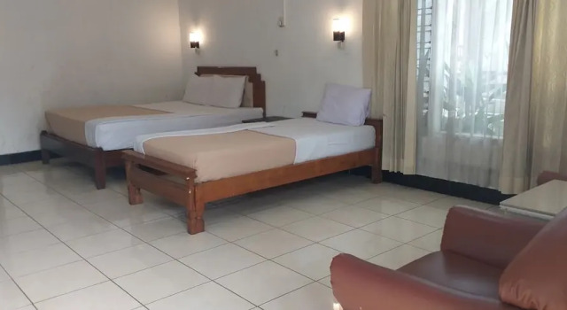 Camera tripla familiare Standard Intan Hotel Purwakarta