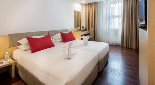 O podwyższonym standardzie dwuosobowy pokój Rocana Hotel