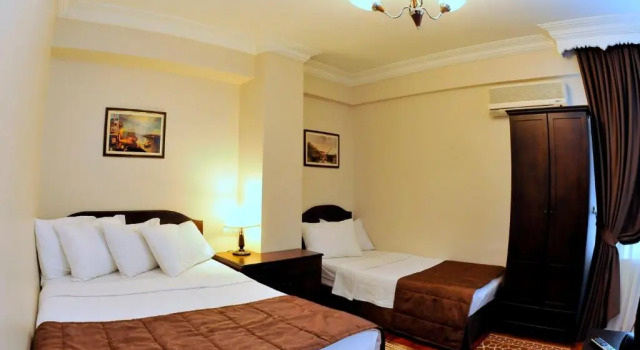 Трёхместный номер The Sunrise Hotel