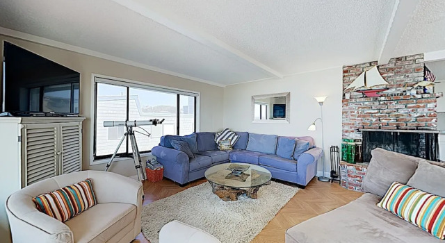 Large Beachfront Home w/ Wraparound Deck home