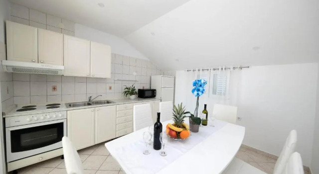 Апартаменты с 2 комнатами с балконом и с видом на море Apartments Baretić