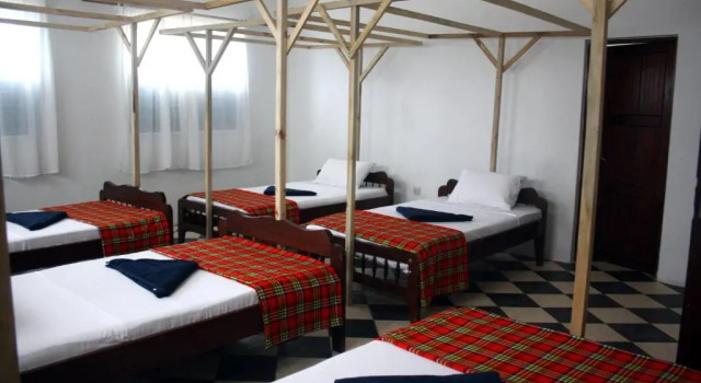 Кровать в общем номере Kimte Beach Lodge