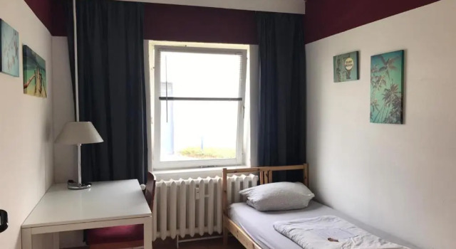 Кровать в общем номере M&R Motel