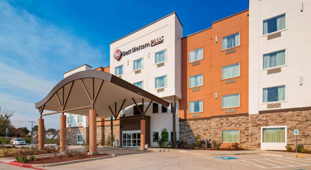 Кровать в общем номере Del-Mar Airport Inn & Suites
