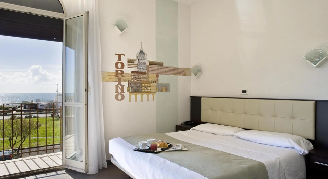 Кровать в общем номере Hotel Bellavista
