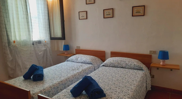 Апартаменты с 2 комнатами с балконом Baia di Ulisse