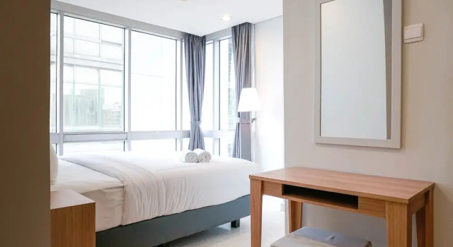 Cozy 2BR at Empyreal Epicentrum Apartment By Travelio, Забронировать Апартаменты/квартира Отели Джакарты с парковкой, рядом с Торговый центр Epicentrum Walk, Парковка