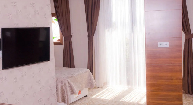 Luksusowy trzyosobowy pokój Kerimbey Hotel