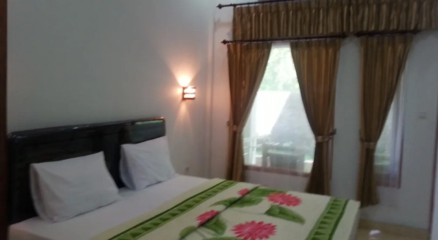 Двухместный номер Standard с балконом и с красивым видом из окна Krisna Home Stay