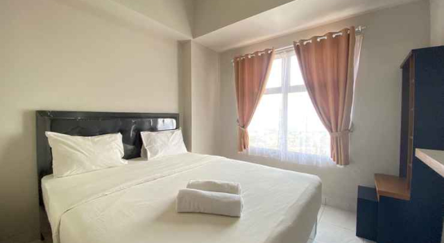 Comfy & Strategic Location 2BR Apartment at Newton Residence near Tol Buah Batu By Travelio