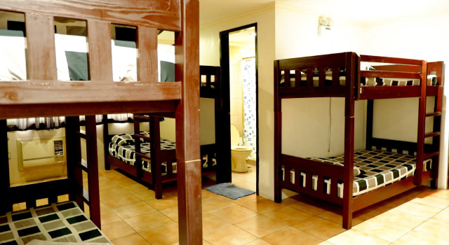 Кровать в общем номере The Fort Budget Hotel- Bonifacio Global City