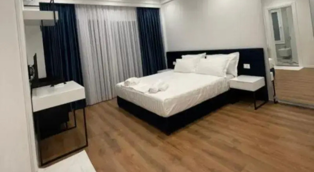 Трёхместный номер Standard с балконом и с видом на море SEA & LAKE VIEW VILLA