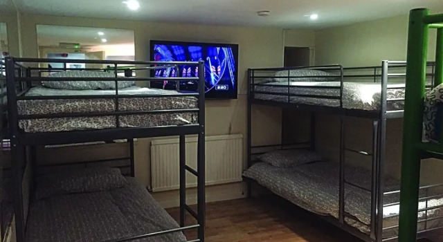 Bett im Wohnheim Bobby's Bunkhouse - Hostel