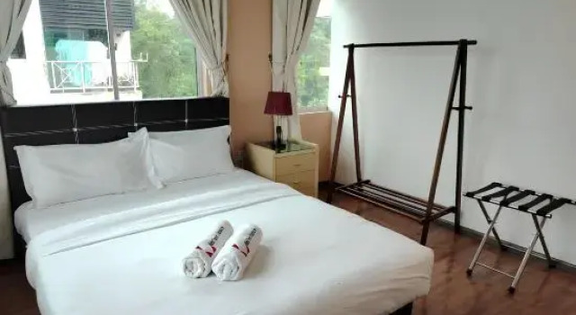 Кровать в общем номере Natol Homestay - Kuching Home Penthouse Airport Road