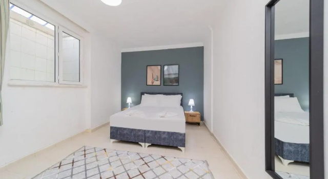 Кровать в общем номере с 6 комнатами Spacious Flat With Backyard in Muratpasa